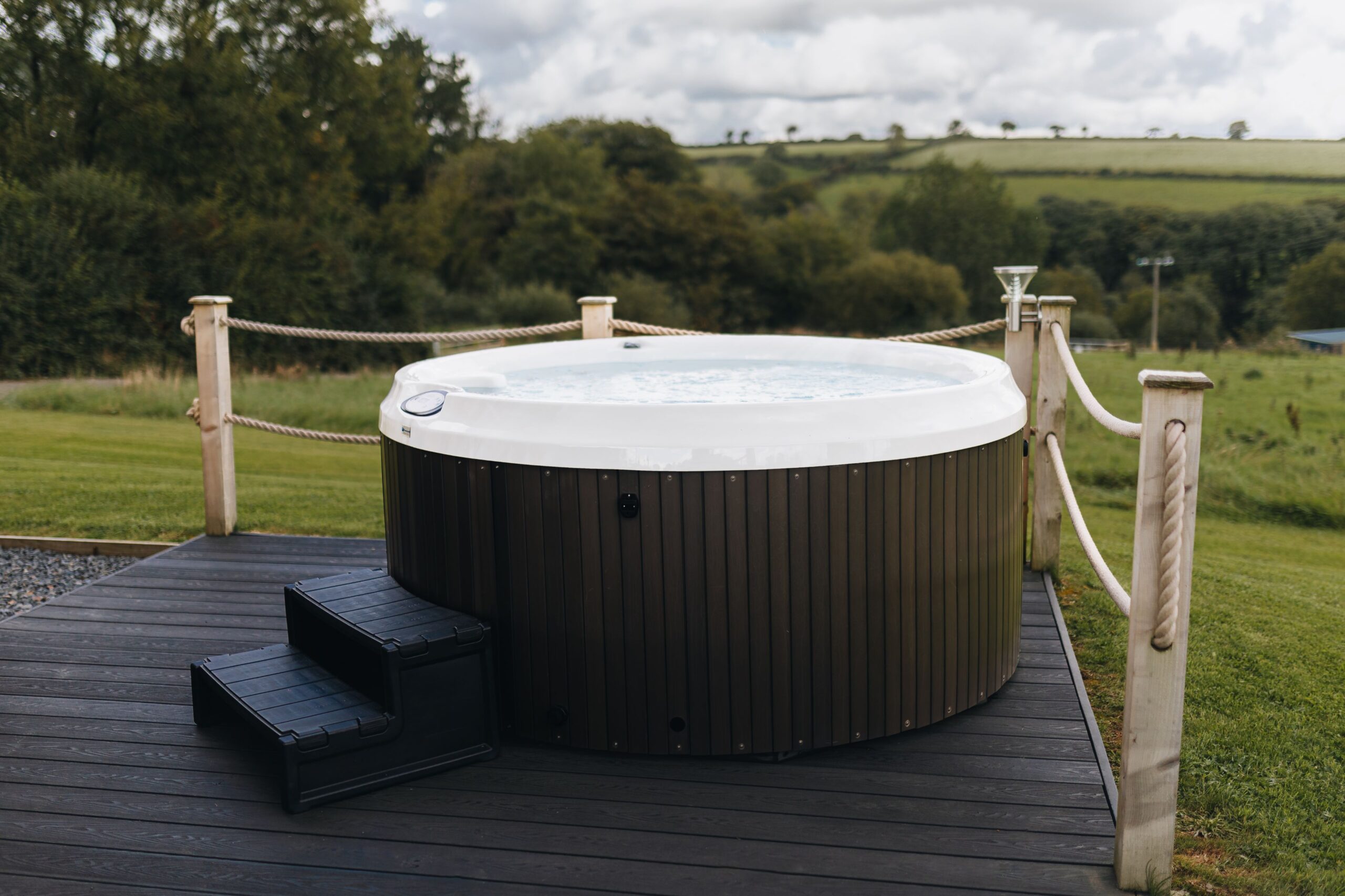 A hot tub on a deck